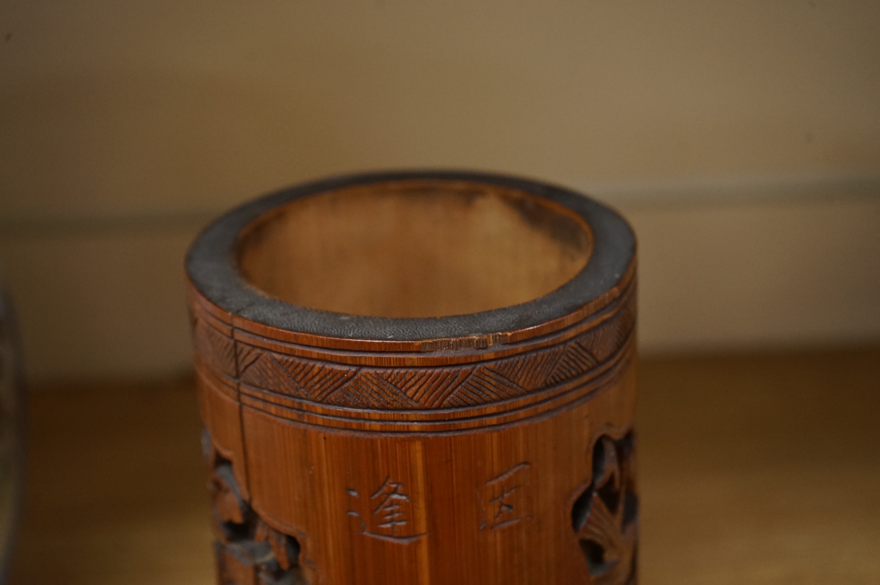 A Chinese carved bamboo vase, 19cm high